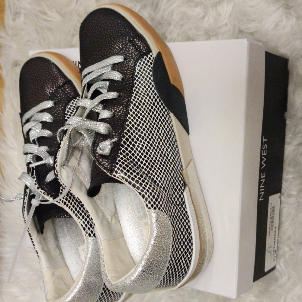 Dolce Vita Sneaker  Mercury Leather Size 8 womans shoe.